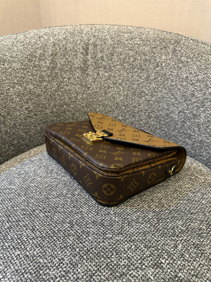Louis Vuitton Metis Bag in Reverse Monogram Canvas