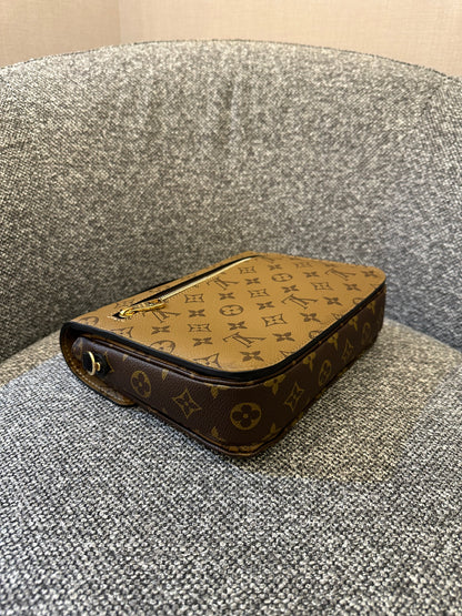 Louis Vuitton Metis Bag in Reverse Monogram Canvas