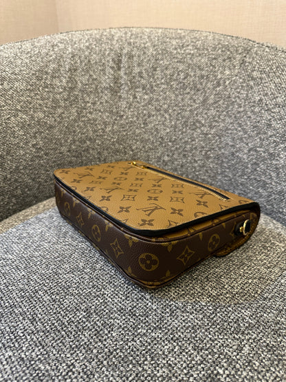 Louis Vuitton Metis Bag in Reverse Monogram Canvas