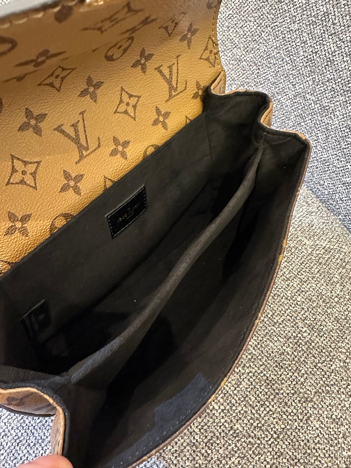 Louis Vuitton Metis Bag in Reverse Monogram Canvas