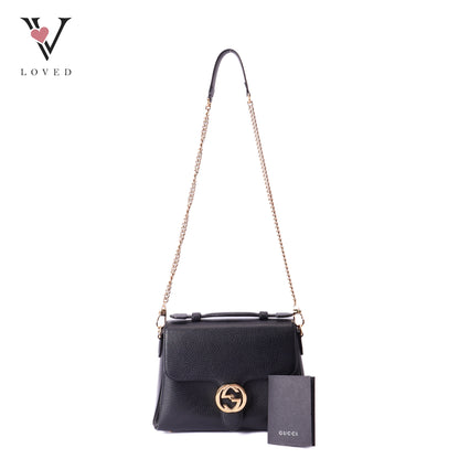 Gucci dollar interlocking GG shoulder bag in black leather