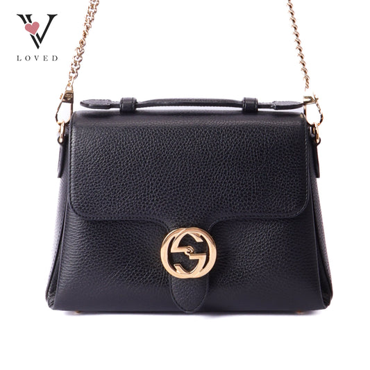 Gucci dollar interlocking GG shoulder bag in black leather