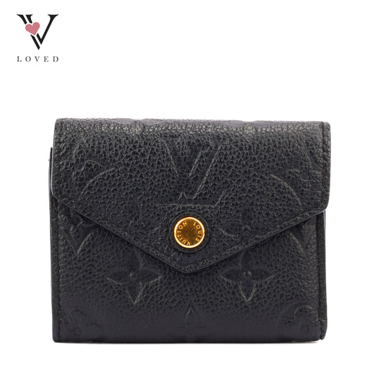 Louis Vuitton Zoe Wallet In Black Embossed Empreinte Leather