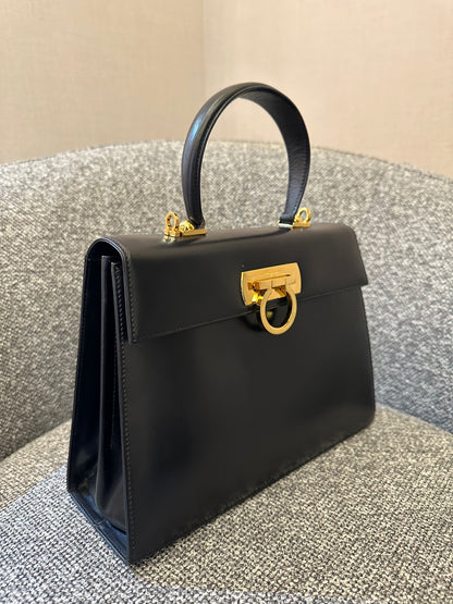 Salvatore Ferragamo Gancini Top Handle Bag in Black Leather