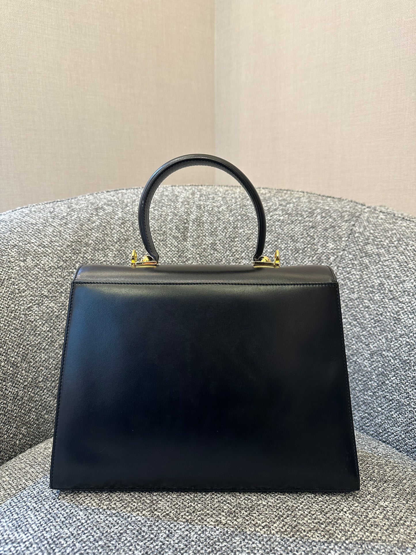 Salvatore Ferragamo Gancini Top Handle Bag in Black Leather