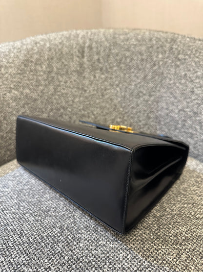 Salvatore Ferragamo Gancini Top Handle Bag in Black Leather