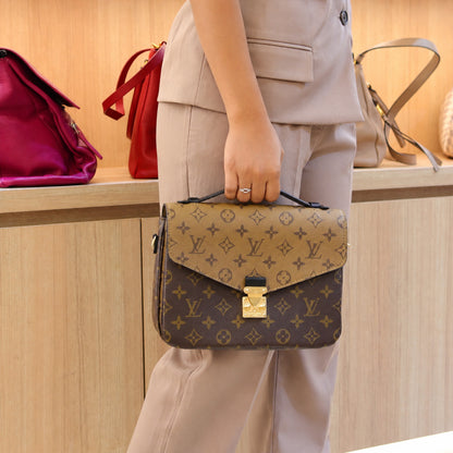 Louis Vuitton Metis Bag in Reverse Monogram Canvas