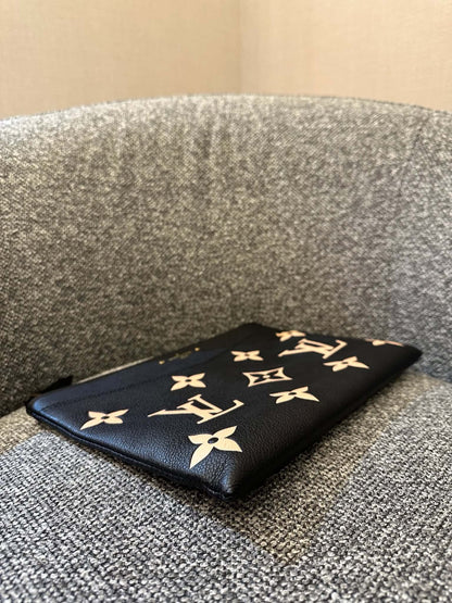 Louis Vuitton Bicolor Monogram Empreinte Daily Pouch In Noir